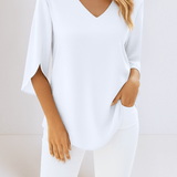 Top elegante con scollo a V e maniche aperte